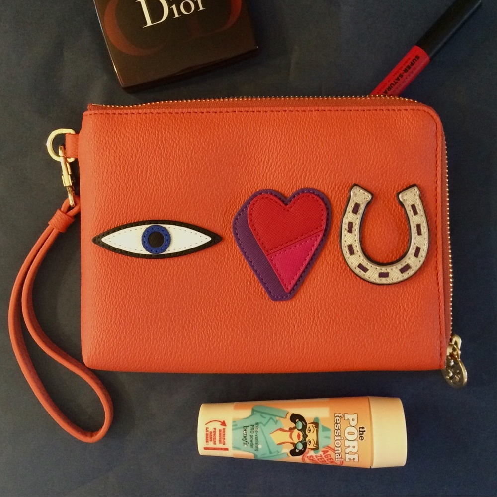 Authentic Tory Burch Orange “love you” pouch 8x6”
